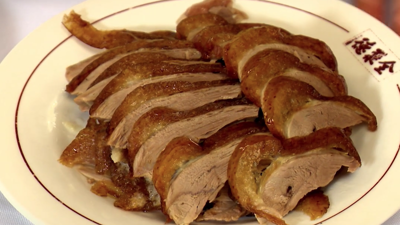 plate of carved roasted duck in Beijing