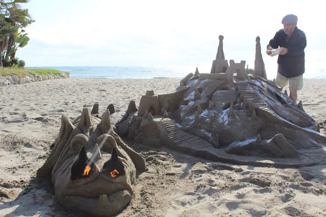 sand castle palm trees on the beach southern spain