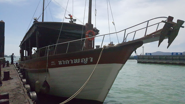 Taking the slow boat around Phuket Town Thailand