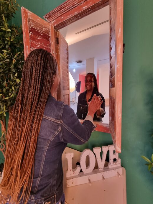 Stacey looking into the mirror