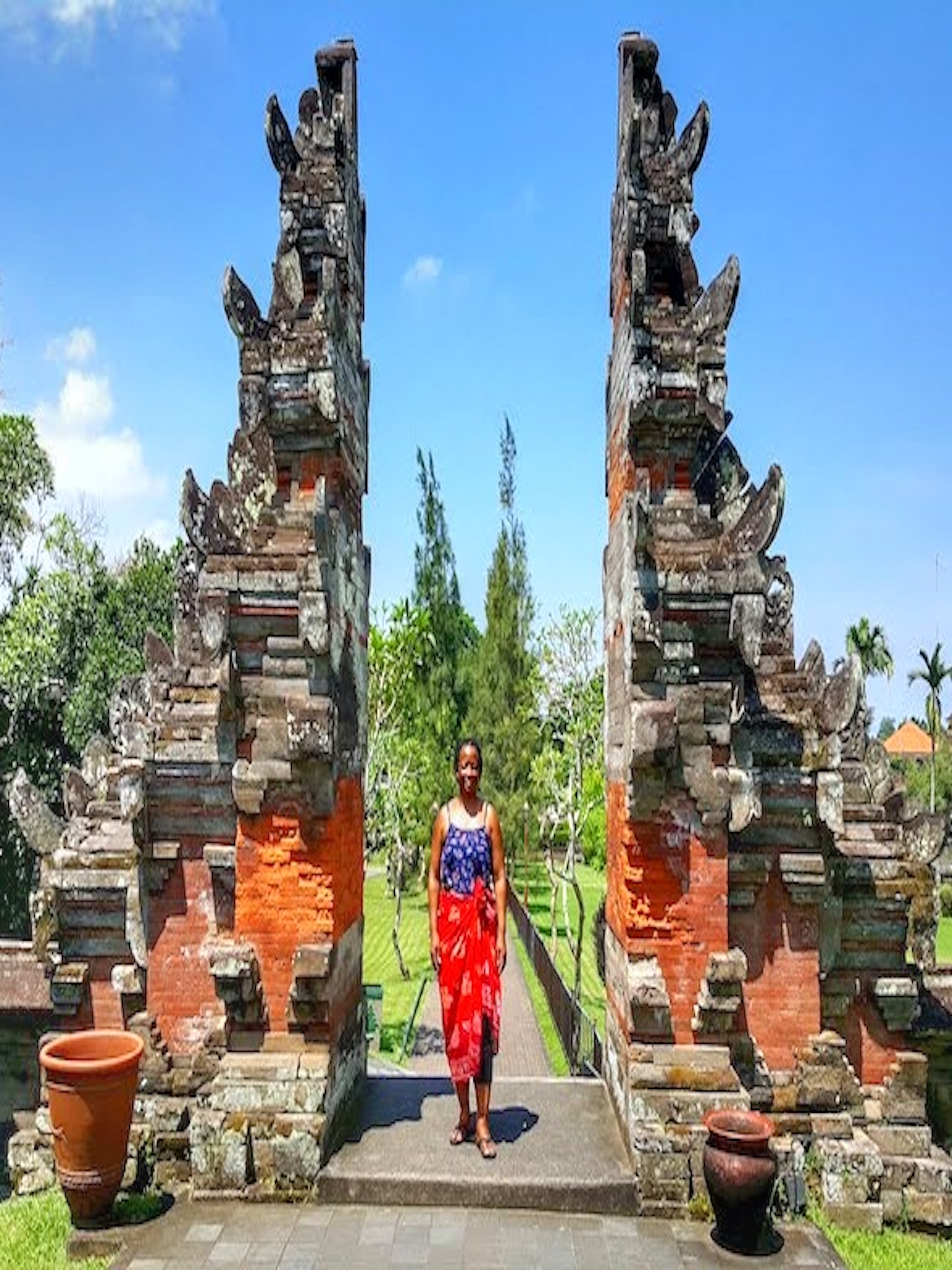 standing between duffelbagspouse Bali Temple Gates-01