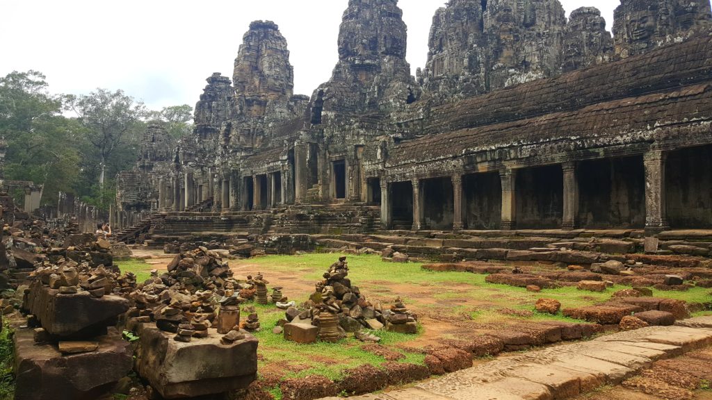 Beautiful columns and rubble at Angkor Wat's Angkor Thom Temple outside of Siem Reap Cambodia