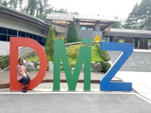 Stacey, border tour duffelbagspouse travels DMZ sign South Korea