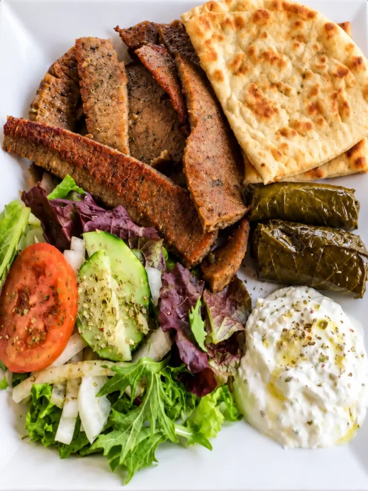Greek Feast Filling the White Platter