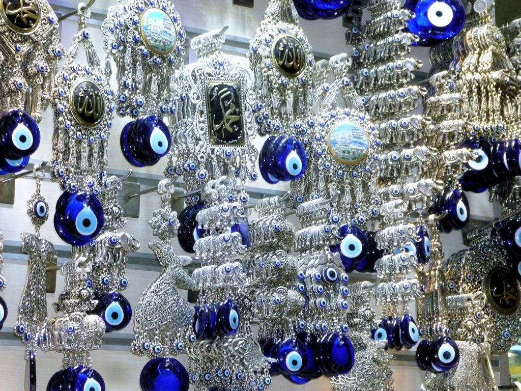 Shopping in Istanbul markets, street stalls and bazaars for Turkish souvenirs can be fun, cheap, historic, delicious and an adventure you won't ever forget. Evil eye amulets