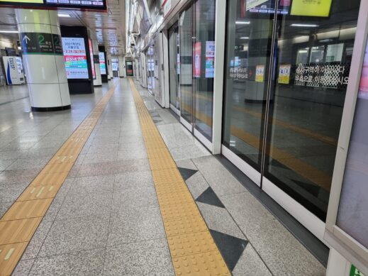 metro floor markings include raised yellow rubber tiles for sight impaired
