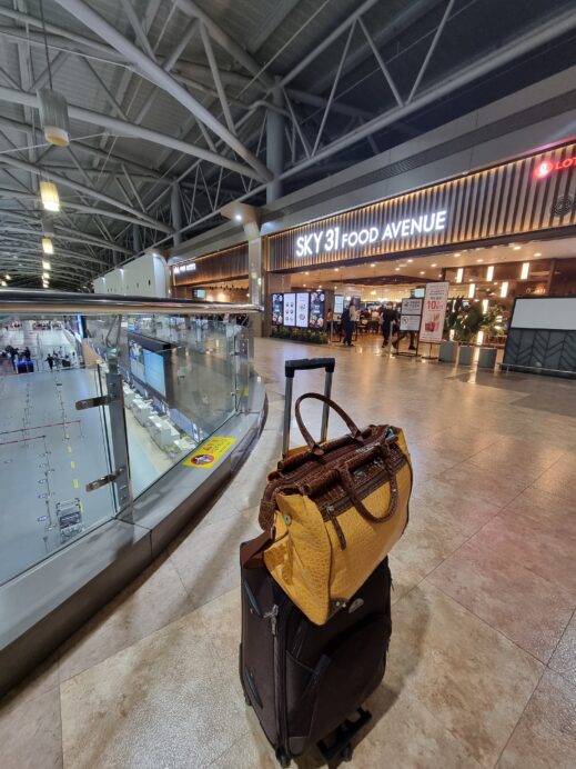 My beautiful bright yellow Samantha Brown Faux crocodile luggage for my 5 day trip to Singapore