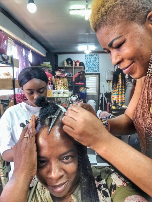 Military spouse getting hair braided