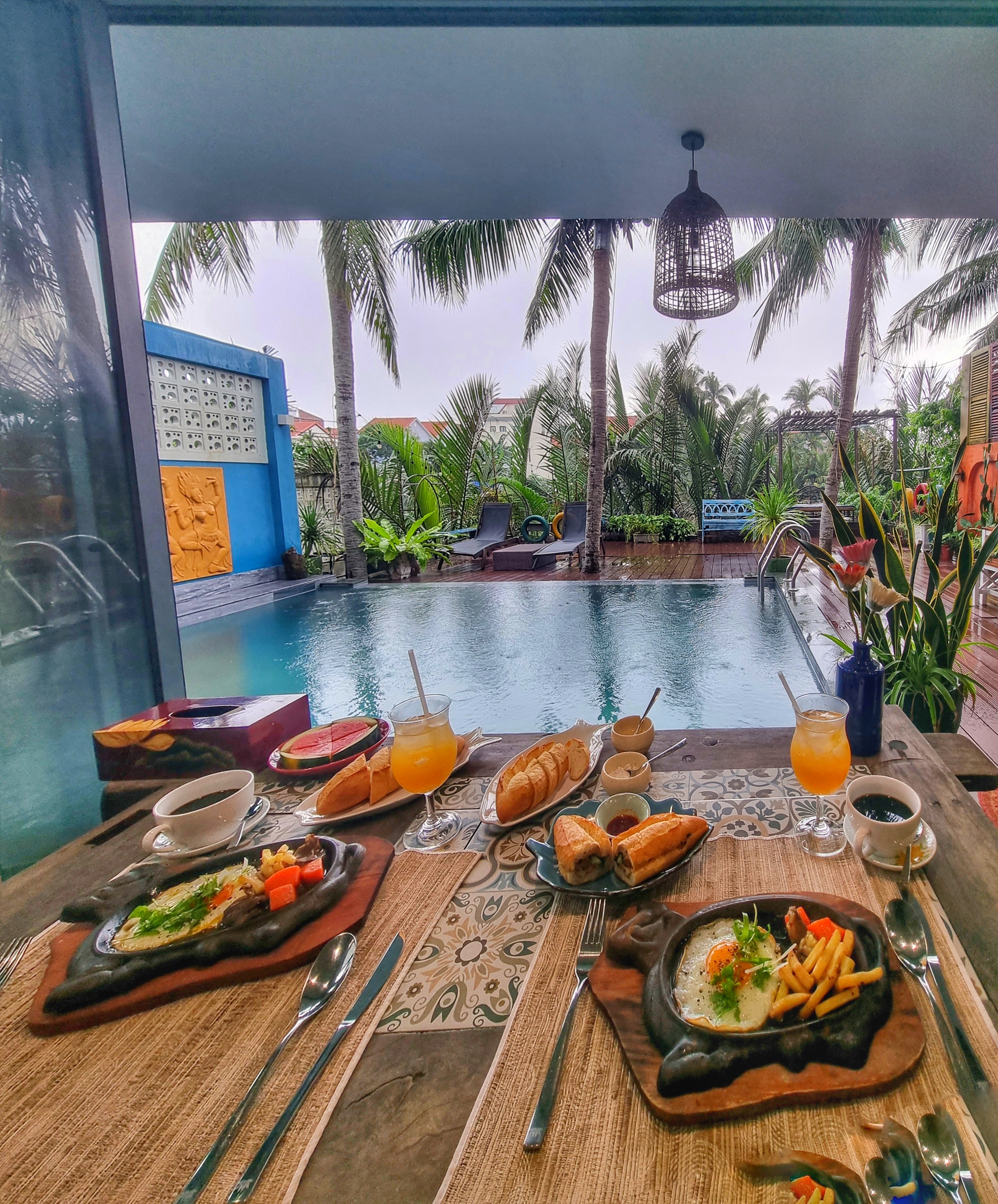 Hoi An Boutique G Resort pool breakfast
