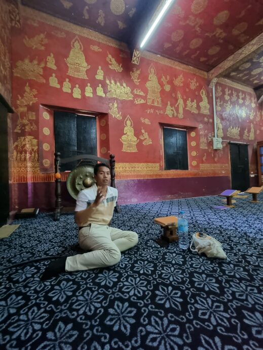 inside the temple- monk chat in Laos
