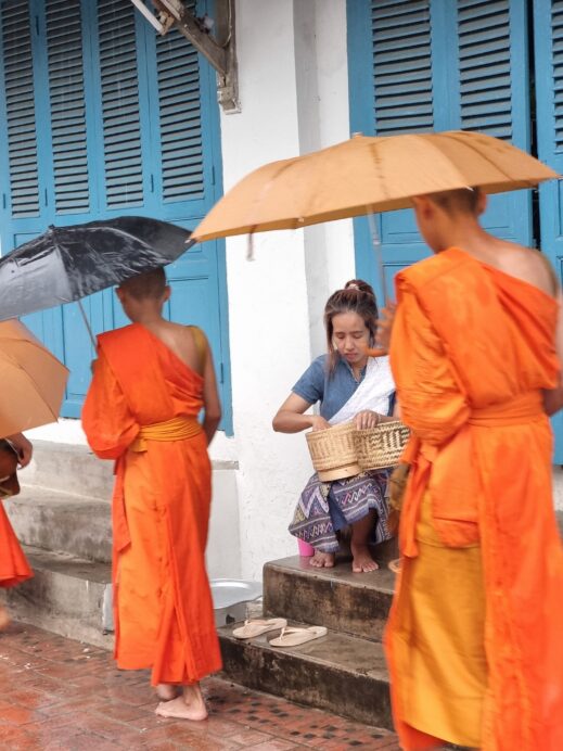 Alms by local woman