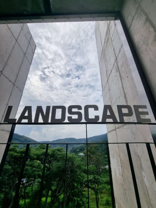 Sign with sky and mountains view