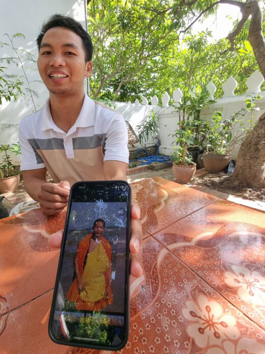 Buddhist Monk phone in Luang Prabang Laos
