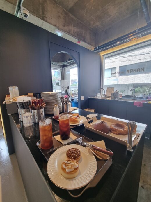 Madeleine Apsan Cafe bakery items ON COUNTER
