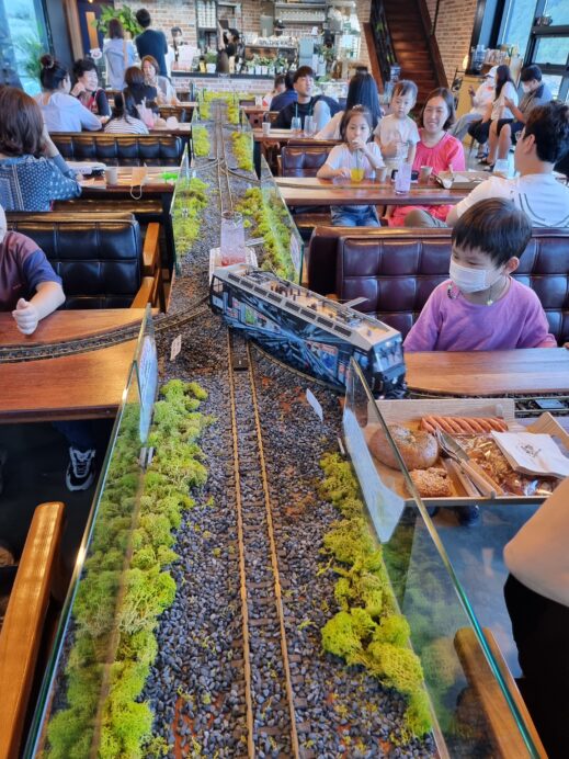 On the Rails closeup center track with kids