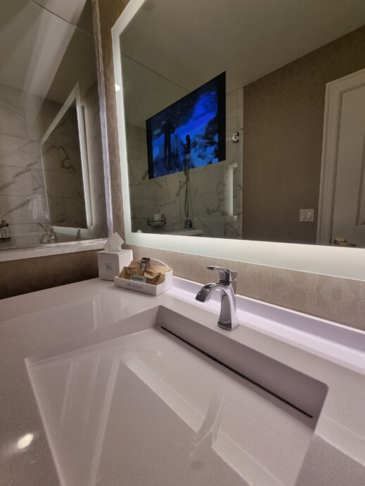 built in TV-in-mirror furniture Bathroom-at-Hotel-Saint-Louis