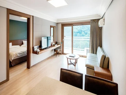 Sono Belle Resort livingroom bedroom
