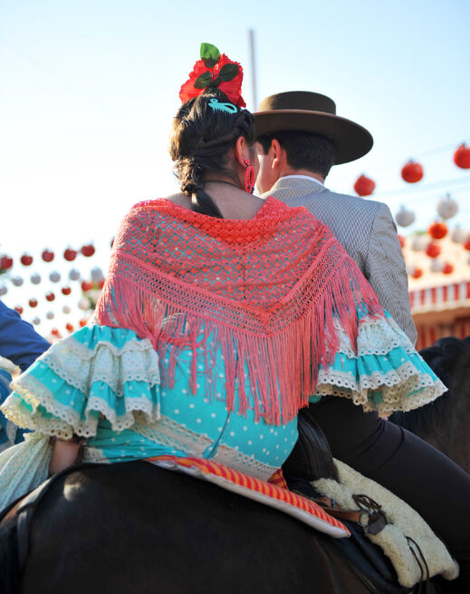 Young,People,Dressed,In,Traditional,Costumes,Riding,Horse,At,The