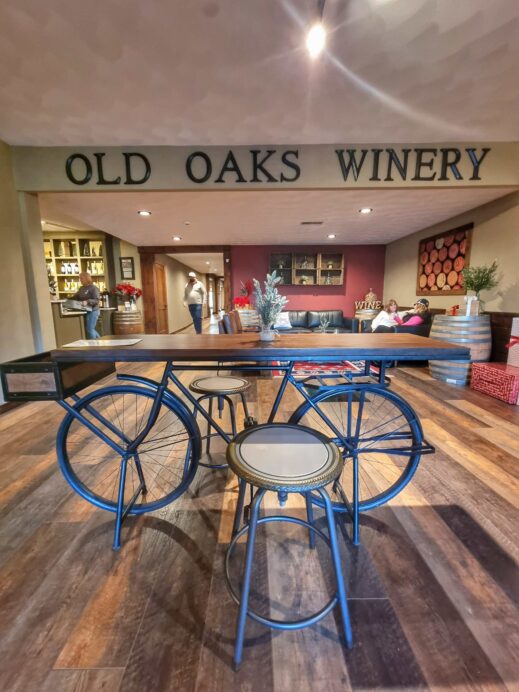 Old Oaks Winery, Quad Cities, bicycle under sign