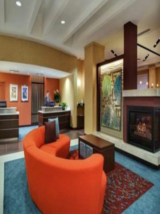 Orange sofa Residence Inn by Marriott