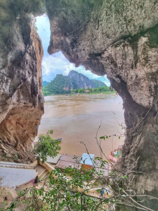looking down at Mekong River cave entrance