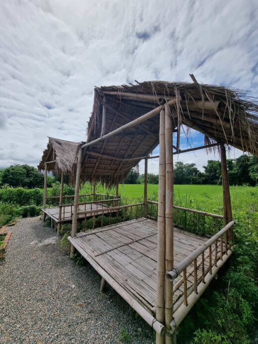 wooden raised covered seating areas at The View Hotel in Chiang Dao