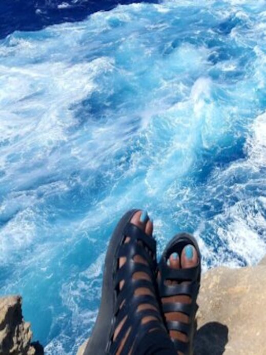 Blue-toe-polish-over-the-Malta-sea-338x450