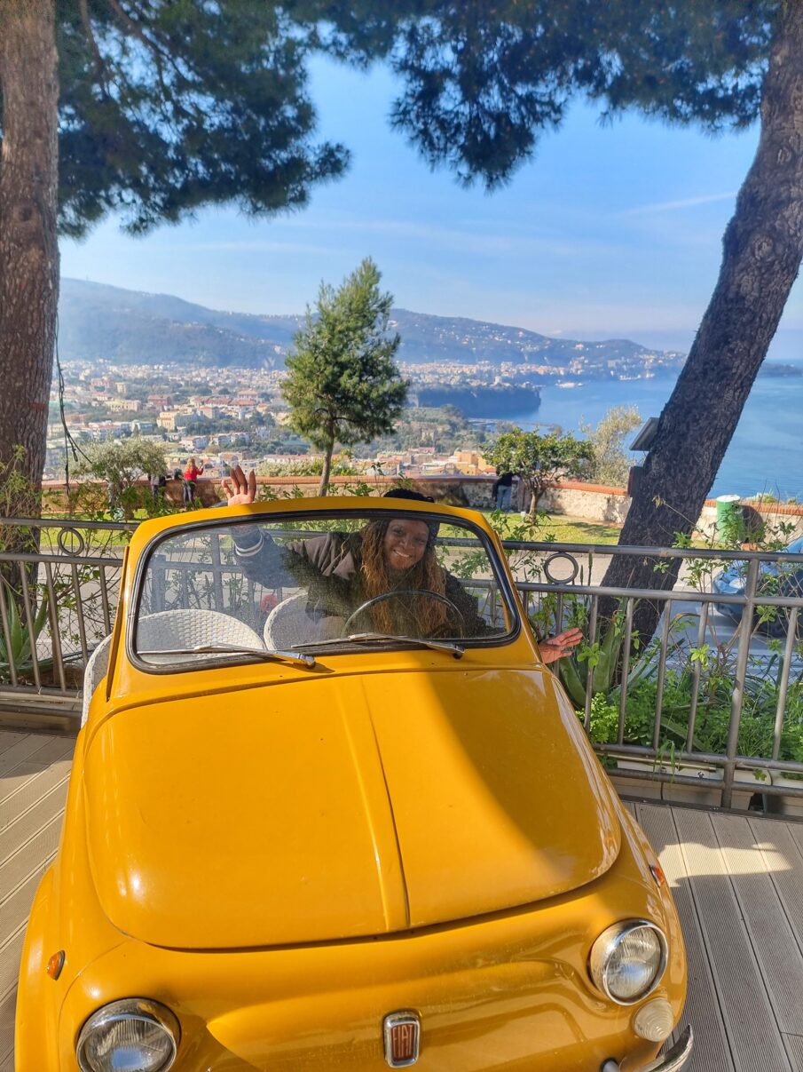 Stacey in a Fiat Amalfi Coast