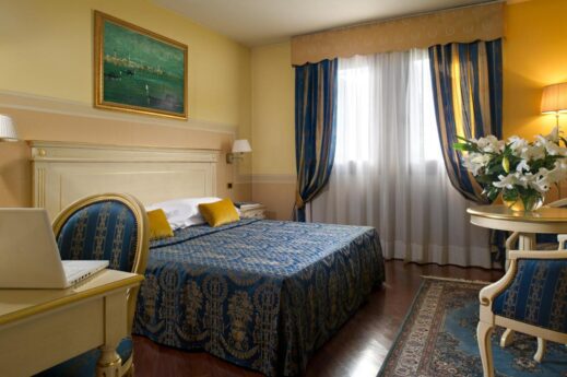 blue bedroom at Villa Pace Park Hotel Bolognese