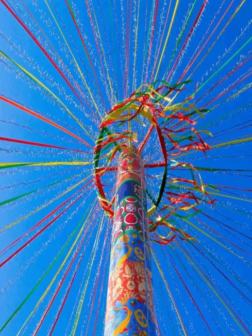 Amana, Iowa - May 1, 2023: Amana Colonies founded by German Radical Pietists. May poles decorate