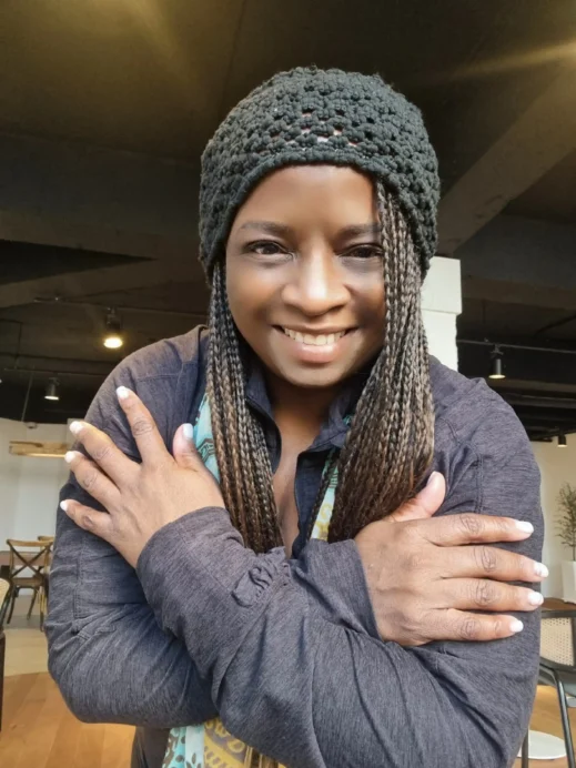 stacey, purple jacket, black knit cap, Duffelbagspouse Travels Home