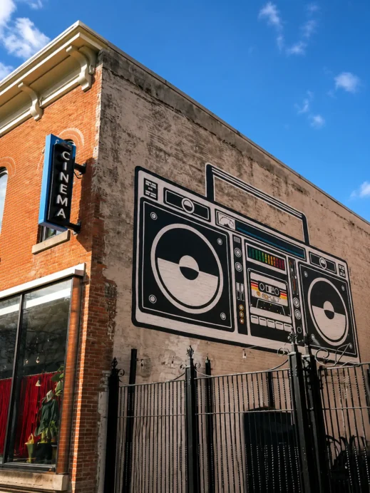 Retro Boombox Mural Under Blue Skies