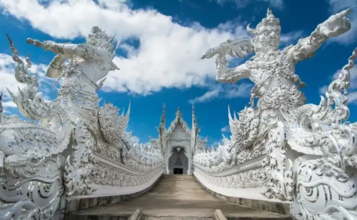 white temple entrance in Chiang Rai