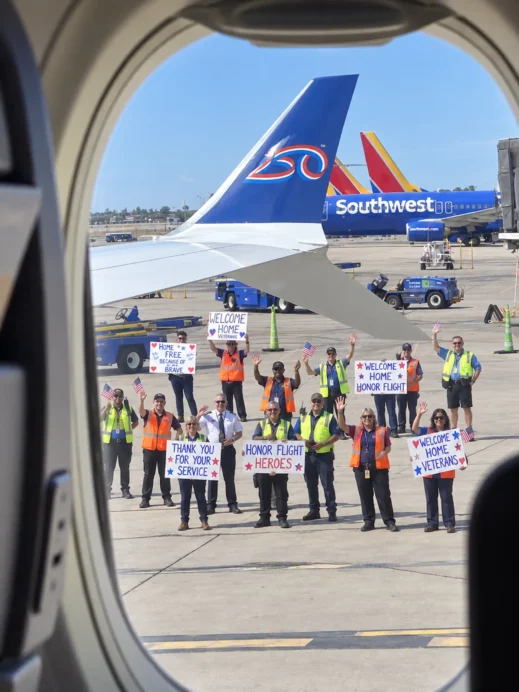 Honor Flight Welcome Through the Airplane Window
