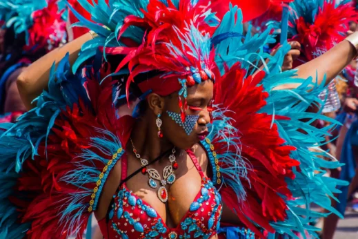 Performers dancing during Toronto’s Caribana festival, a cultural celebration central to Canadian travel.