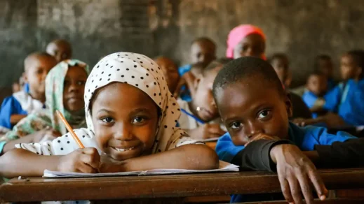 Smiling Children in African Classroom Setting