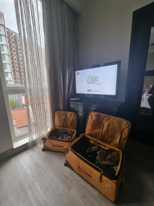 Village Albert Court Hotel yellow luggage