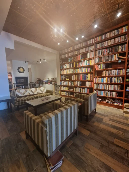 Brewed Book Cafe seating bookshelves
