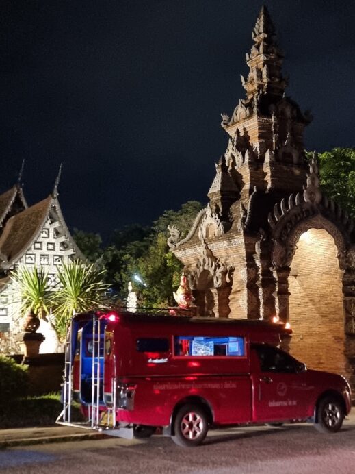 red songthaew at night in Chiang Mai
