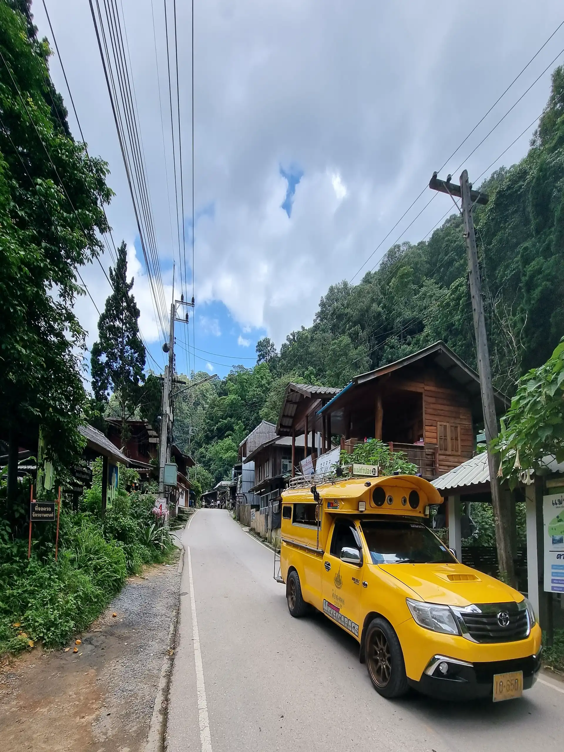 yellow songthaew mae kampong thailand