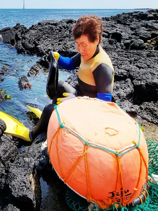 Jeju Photo Haenyo Lady orange float