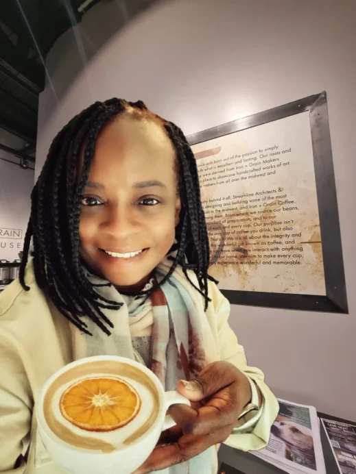 Staacey with a cup of orange tea