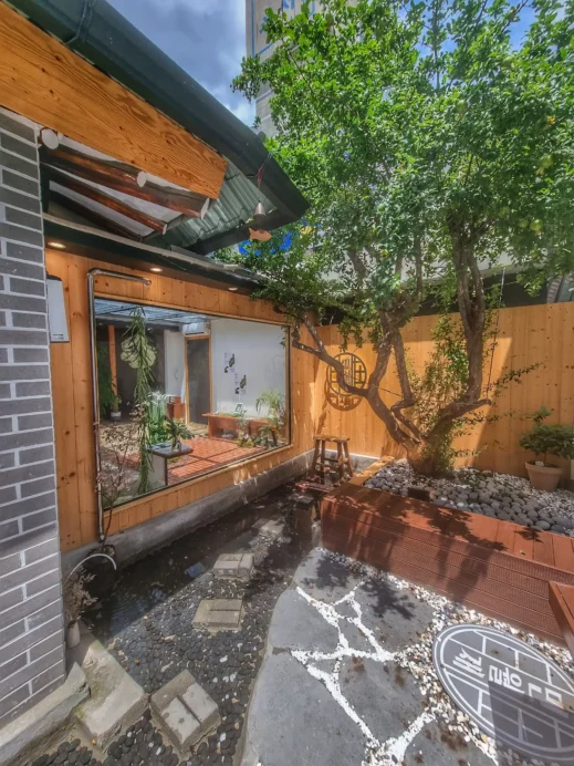 Minwoljae Cafe, large window, courtyard, tree